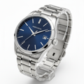 Men's stainless steel automatic watch with blue sunburst dial on white background