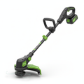 Cordless electric string trimmer weed eater in black and green on white background